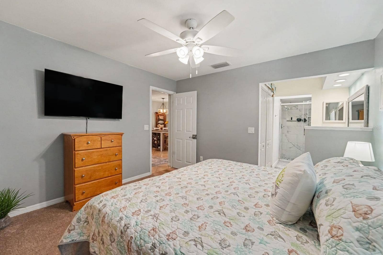 143 CROWN POINT CIRCLE, #143, Longwood, FL 32779 Spacious secondary bedroom with dual beds, walk-in closet, and ensuite bathroom access