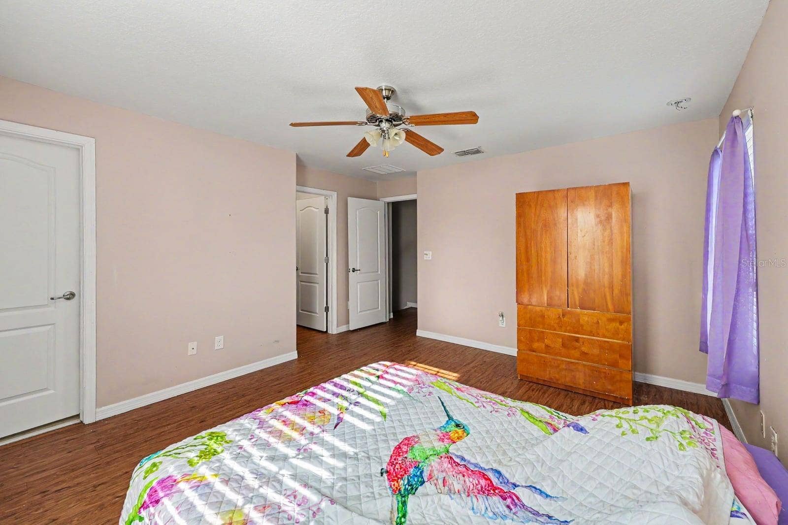 5705 NEW INDEPENDENCE PARKWAY, Winter Garden, FL 34787 Master Suite with Walk-In Closets, Multiple Doors & Wood Flooring