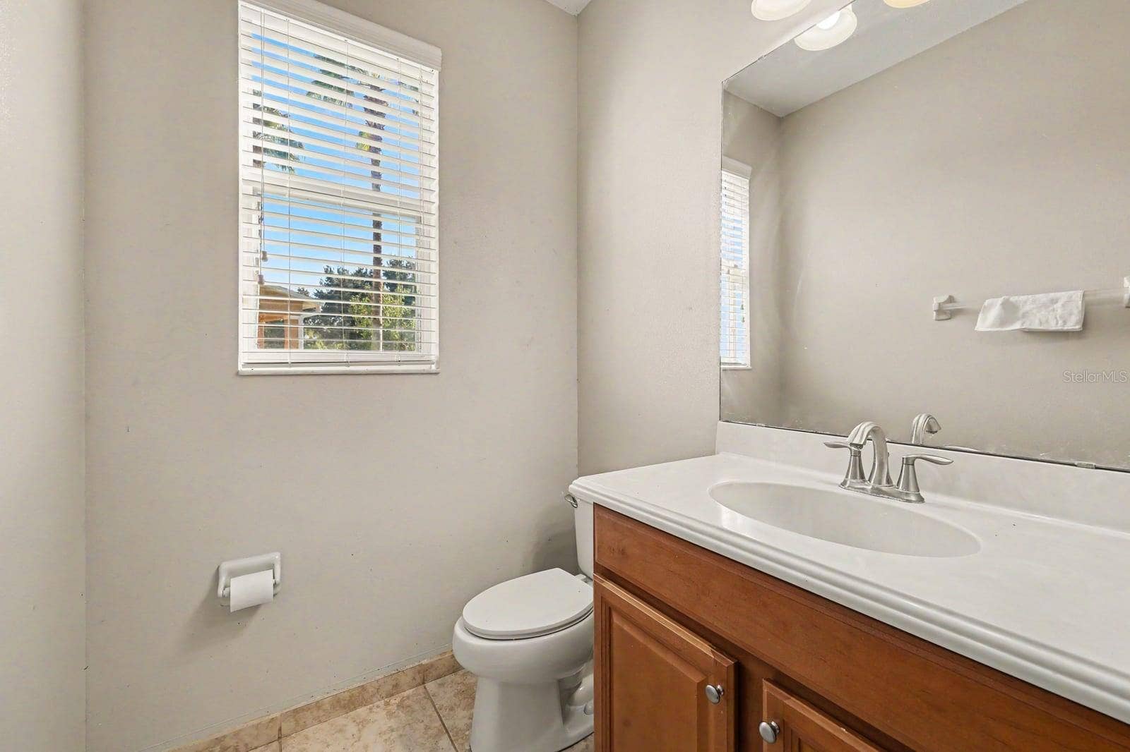 5705 NEW INDEPENDENCE PARKWAY, Winter Garden, FL 34787 Master Bath Features Wood Vanity, Granite Countertop & Window Light