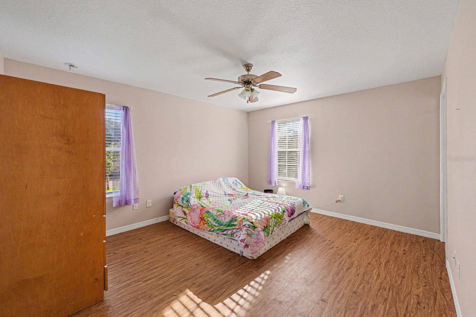 5705 NEW INDEPENDENCE PARKWAY, Winter Garden, FL 34787 Large Bedroom with Multiple Windows, Wood Floors & Ceiling Fan