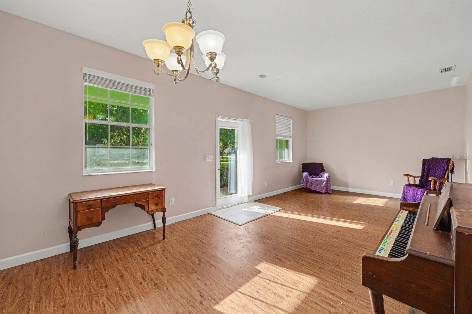 5705 NEW INDEPENDENCE PARKWAY, Winter Garden, FL 34787 Spacious room with hardwood floors and abundant natural light