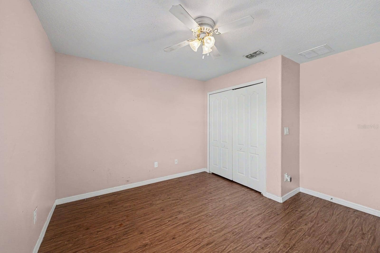 5705 NEW INDEPENDENCE PARKWAY, Winter Garden, FL 34787 Generous Bedroom Space with Dual Closets, Wood Flooring & Fan