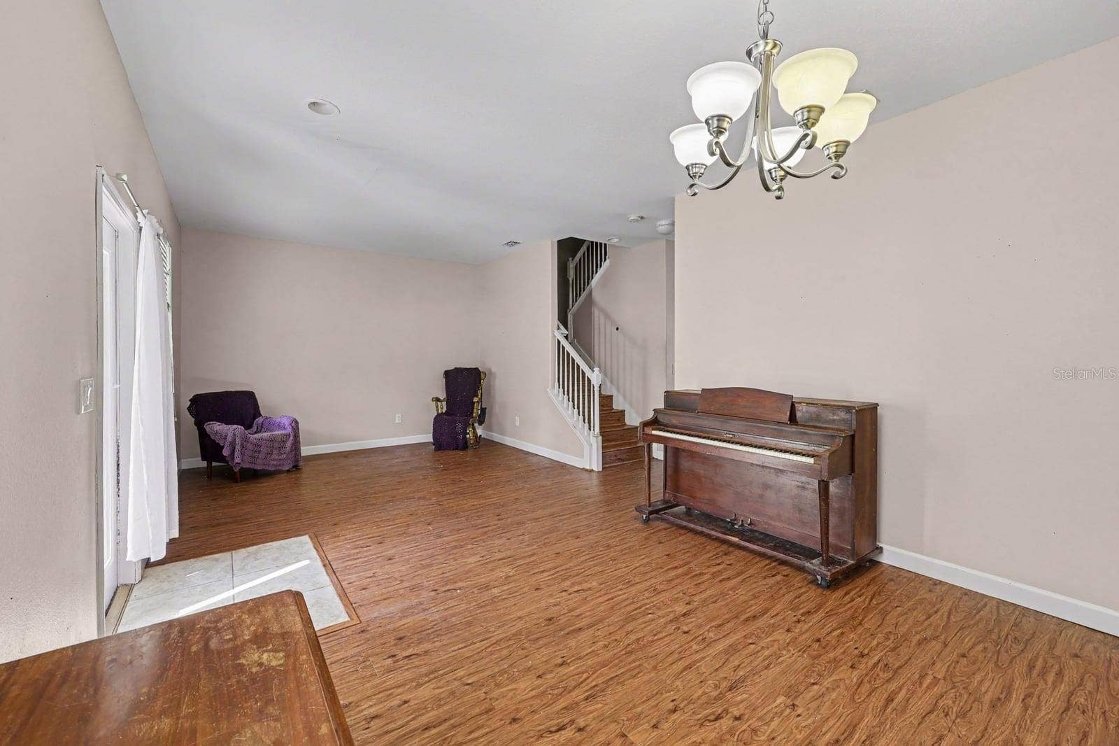 5705 NEW INDEPENDENCE PARKWAY, Winter Garden, FL 34787 Large bonus room with curved staircase and wood flooring