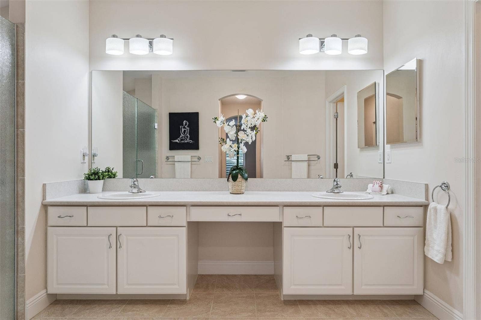 14'6" x 7'6" Primary Bathroom w/ dual sinks & a large glass enclosed walk-in shower