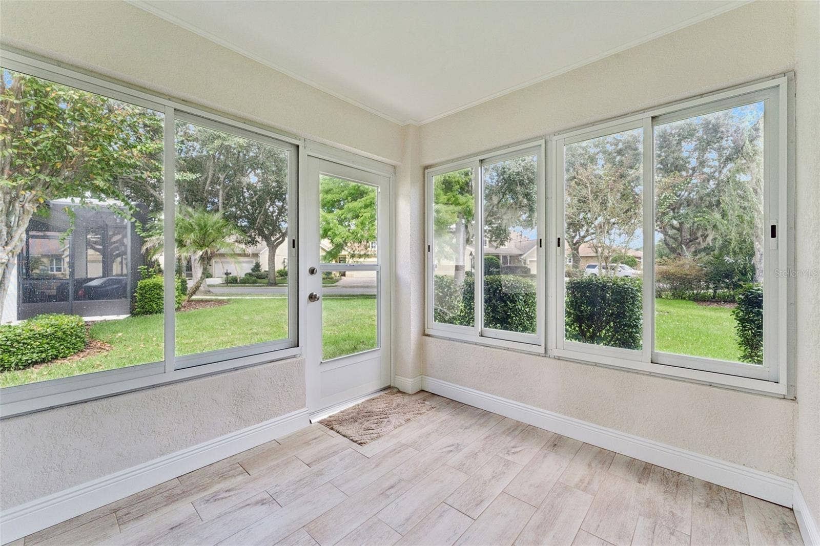8'6" x 9' Enclosed Lanai w/ sliding glass windows & porcelain tile floor