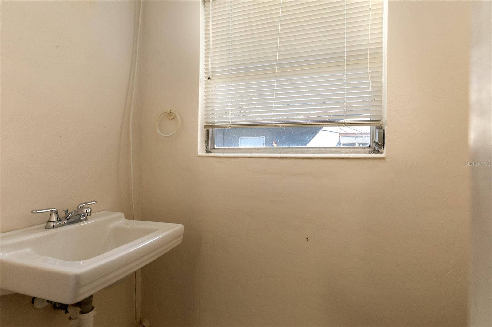 5119 PELLEPORT AVENUE, Belle Isle, FL 32812 1/2 Bathroom