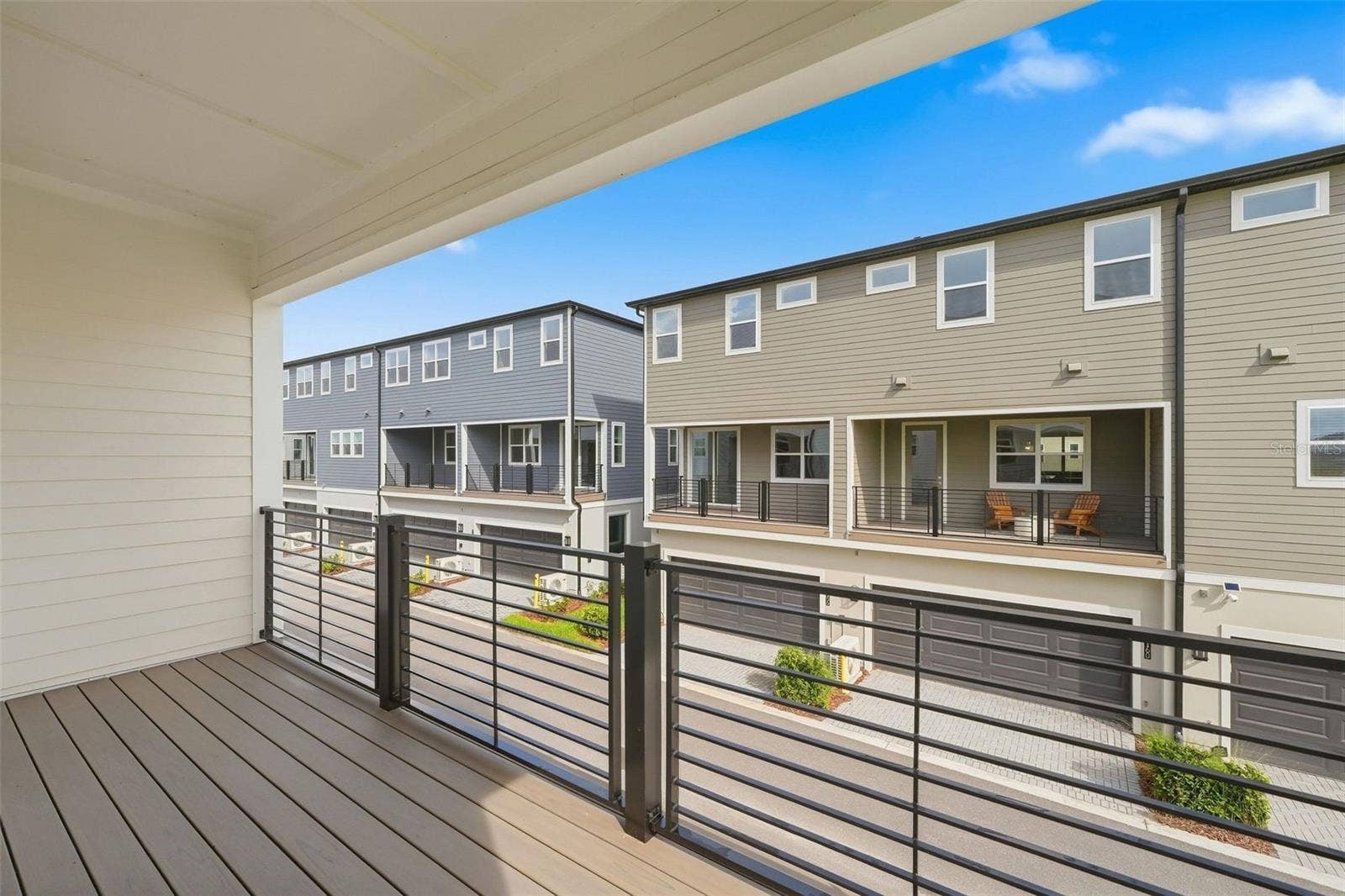9317 LUMINARY BOULEVARD, Orlando, FL 32827 large balcony with Trex flooring