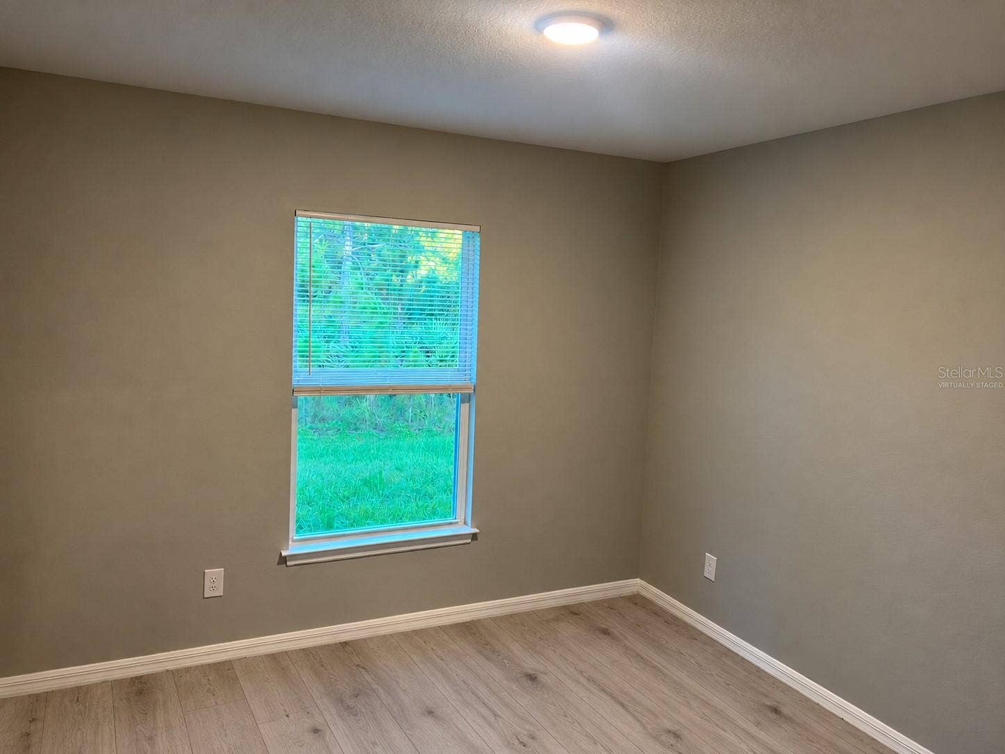 3404 61ST STREET W, Lehigh Acres, FL 33971 Bedroom 3 virtually staged: planned laminate flooring.