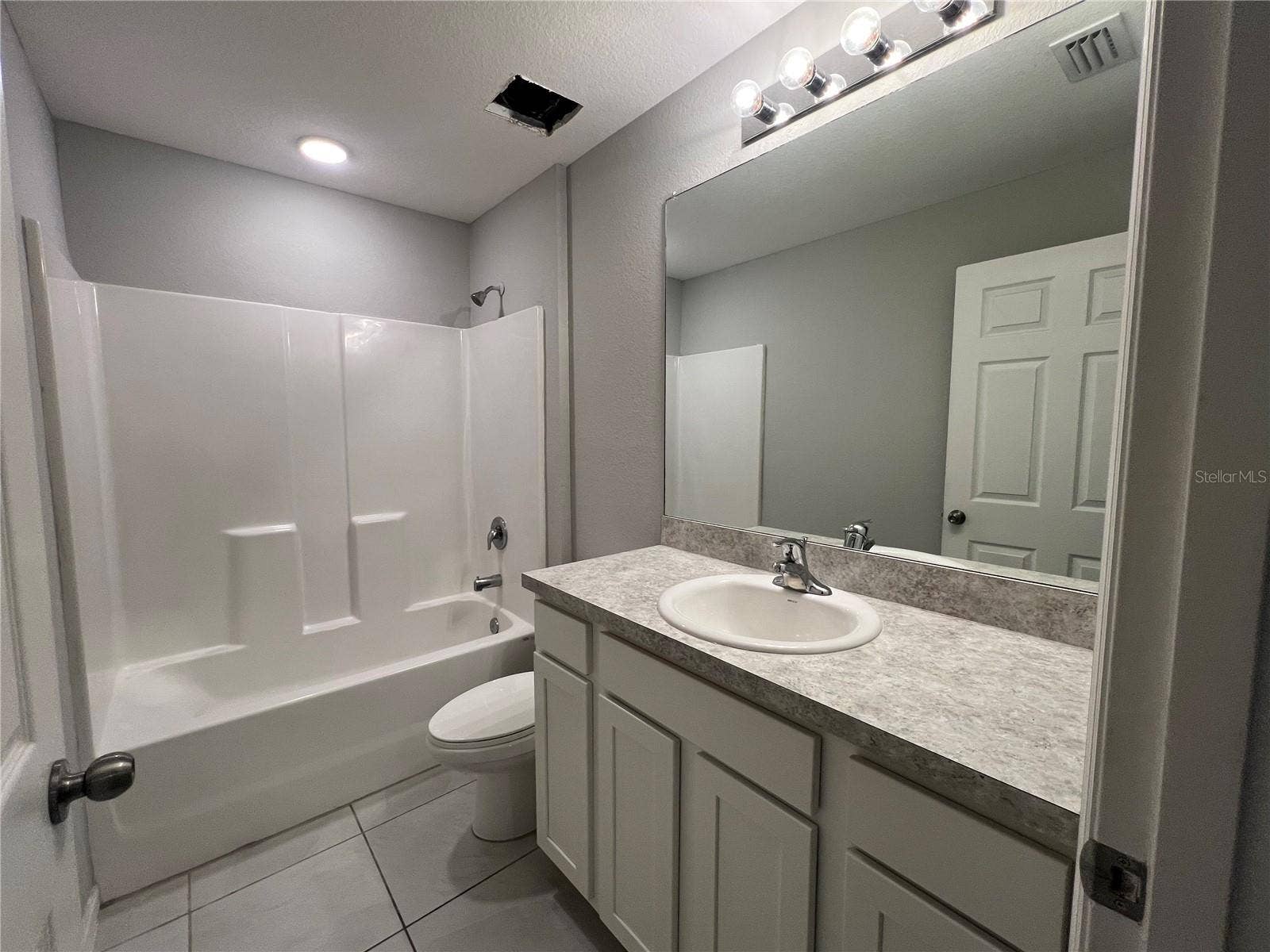 3404 61ST STREET W, Lehigh Acres, FL 33971 Guest bathroom.
