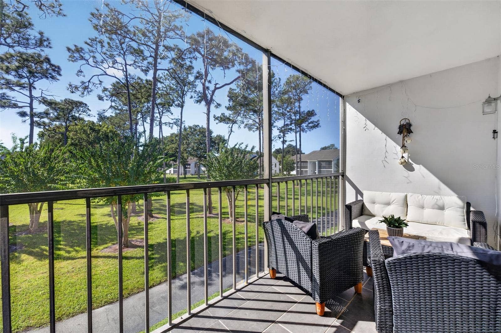 Screened balcony with garden views!