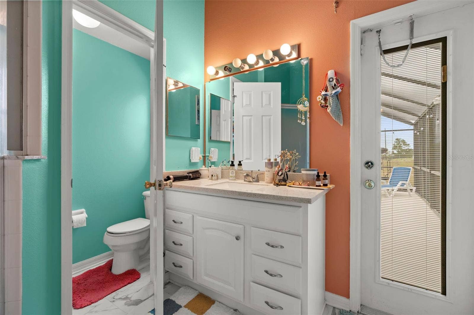551 MAJESTY DRIVE, Davenport, FL 33837 Primary Bathroom with Private Pool Access