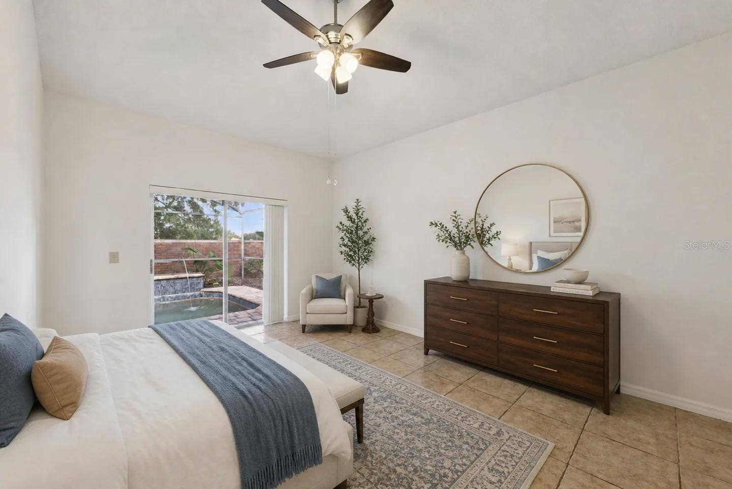 13714 HUNTWICK DRIVE, Orlando, FL 32837 Primary bedroom on the 1st floor, with access to the pool.