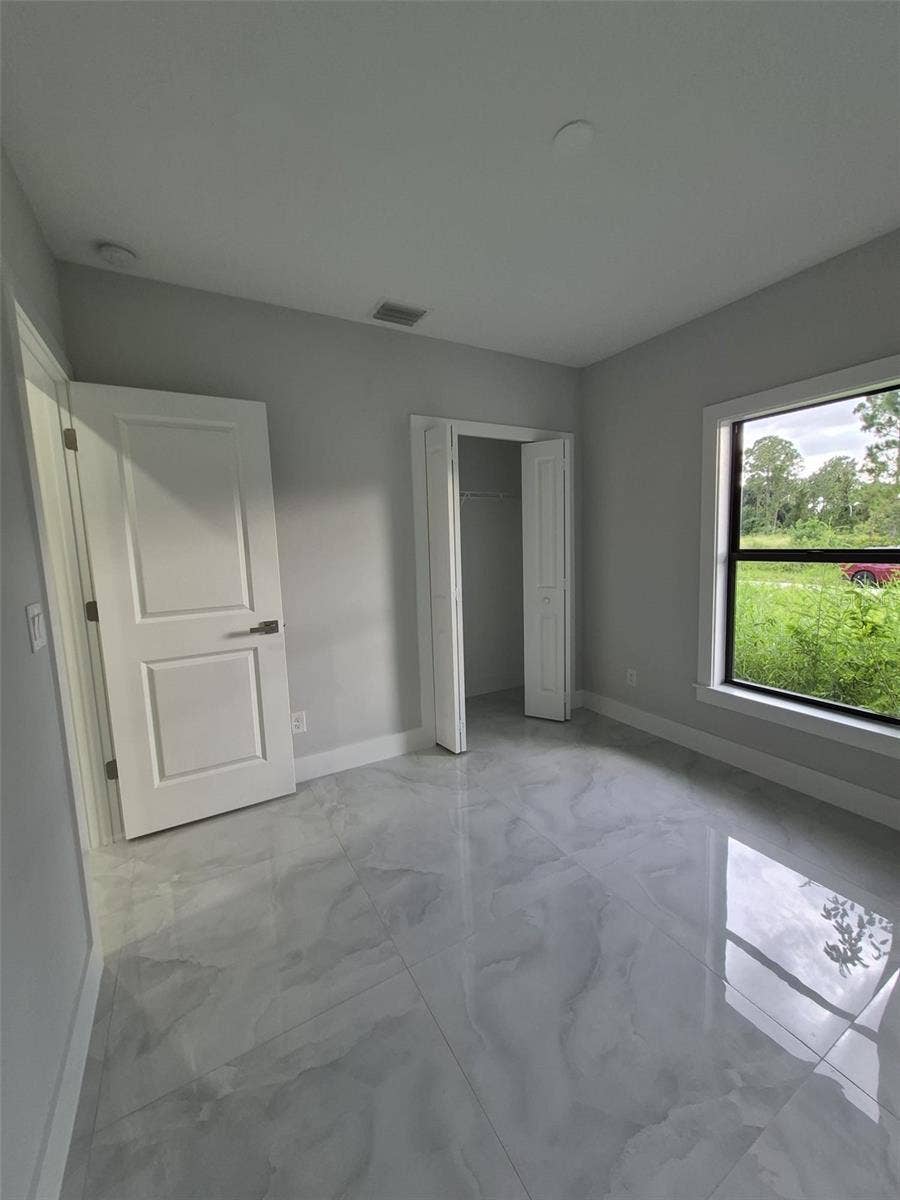 442 WICKHAM AVENUE S, Lehigh Acres, FL 33974