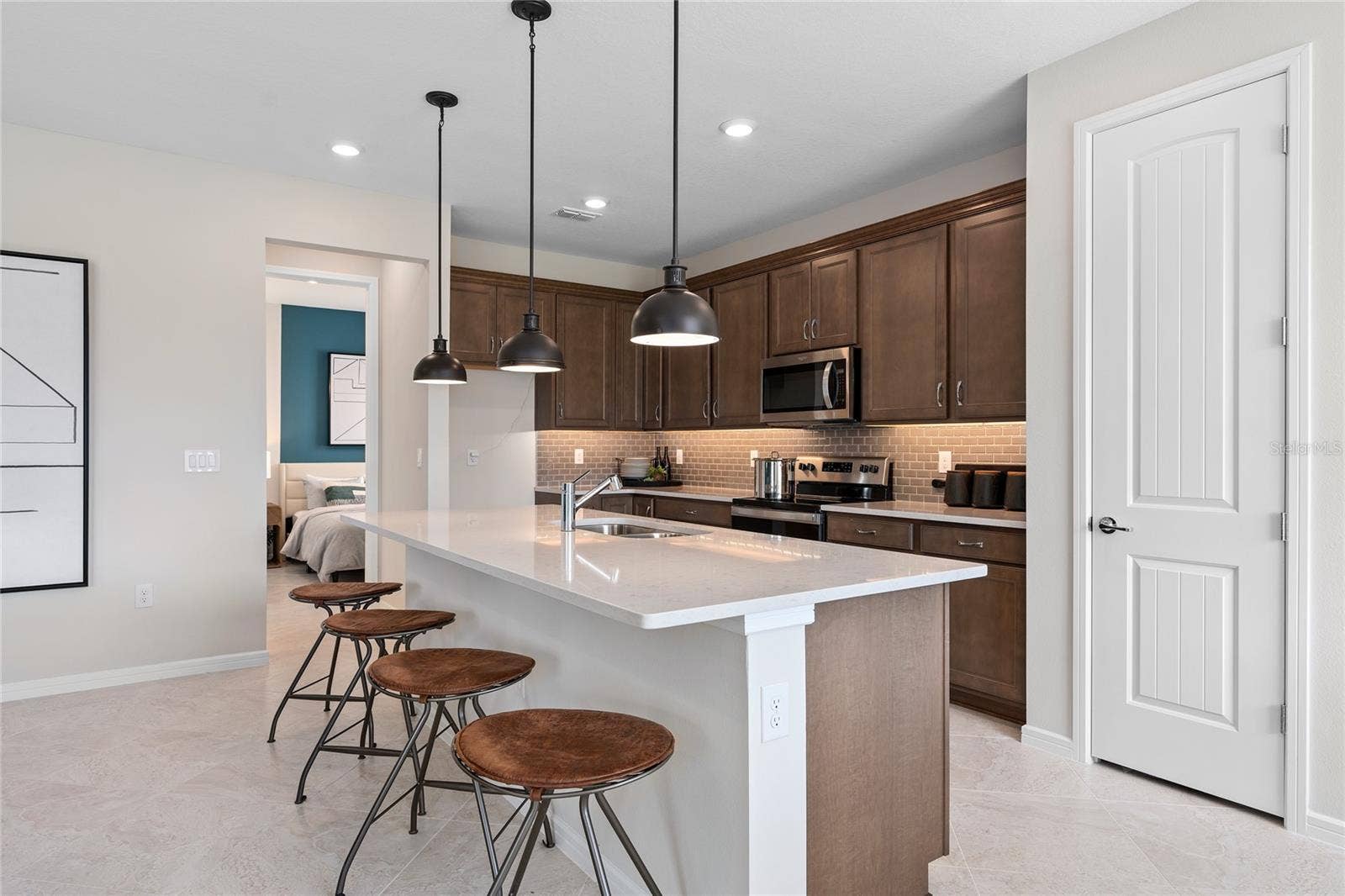 2502 SERENITY GARDEN DRIVE, Kissimmee, FL 34744 Model Home Design Only. Pictures and furnishings are for illustrative purposes only. Elevations, colors and options may vary. Furniture is for model home staging only.