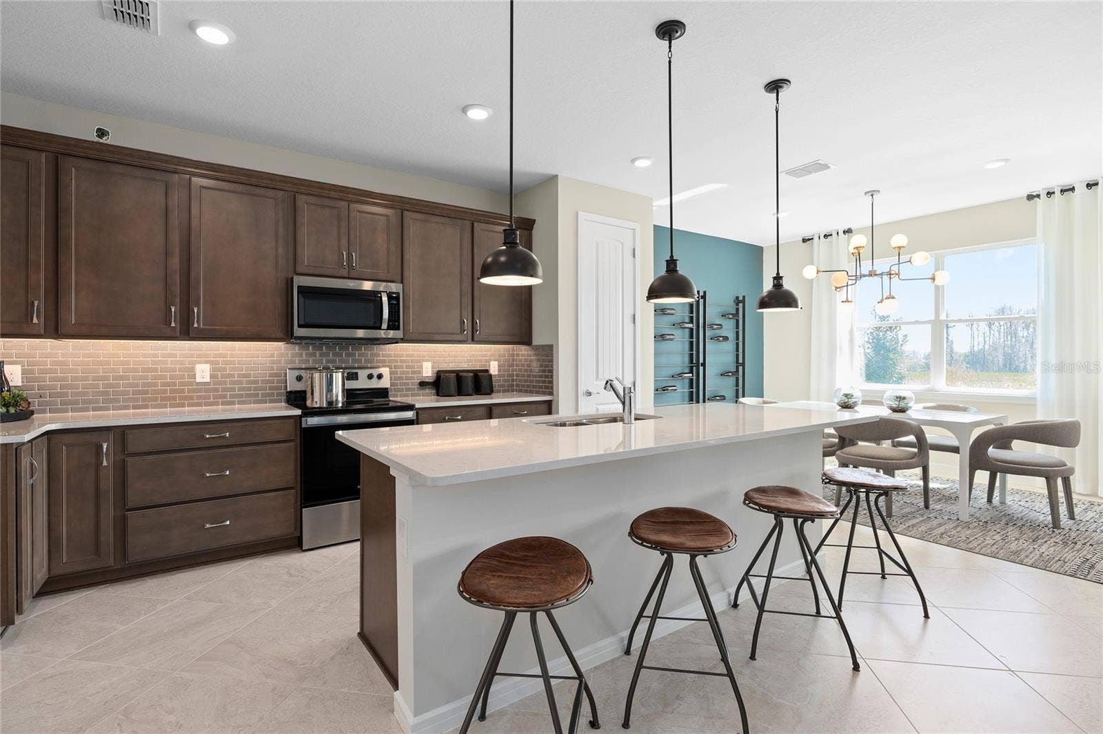 2502 SERENITY GARDEN DRIVE, Kissimmee, FL 34744 Model Home Design Only. Pictures and furnishings are for illustrative purposes only. Elevations, colors and options may vary. Furniture is for model home staging only.