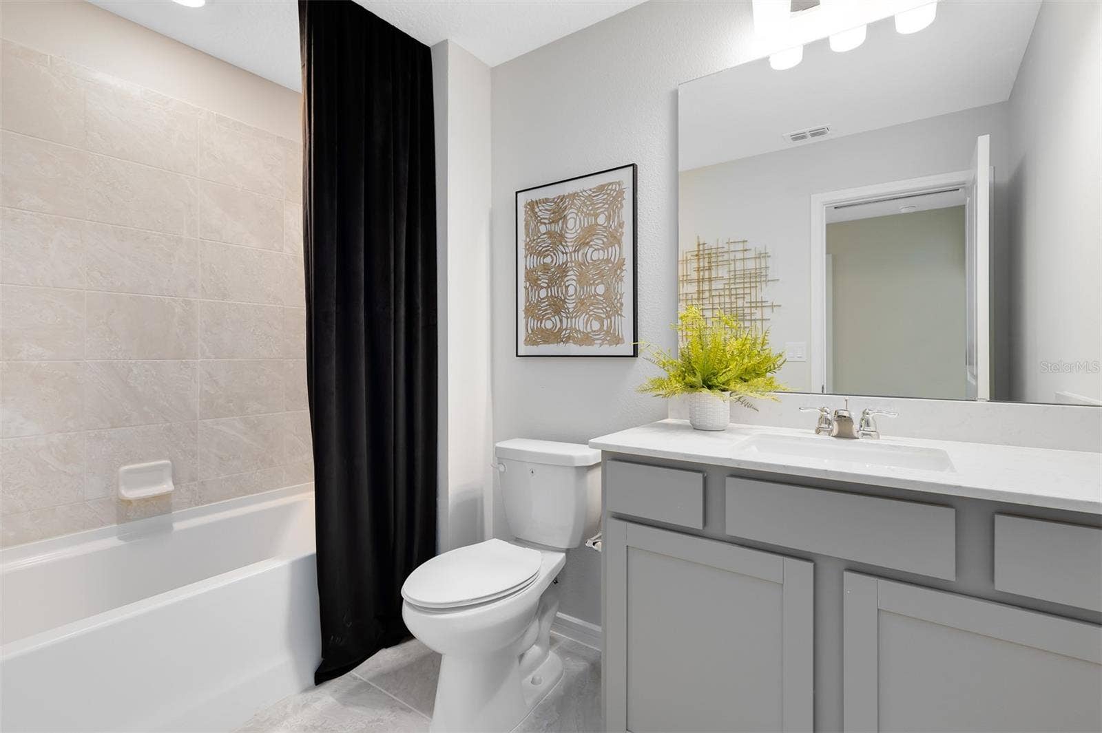 2119 SOUTHBURY DRIVE, Kissimmee, FL 34744 Model Home Design Only. Pictures and furnishings are for illustrative purposes only. Elevations, colors and options may vary. Furniture is for model home staging only.?