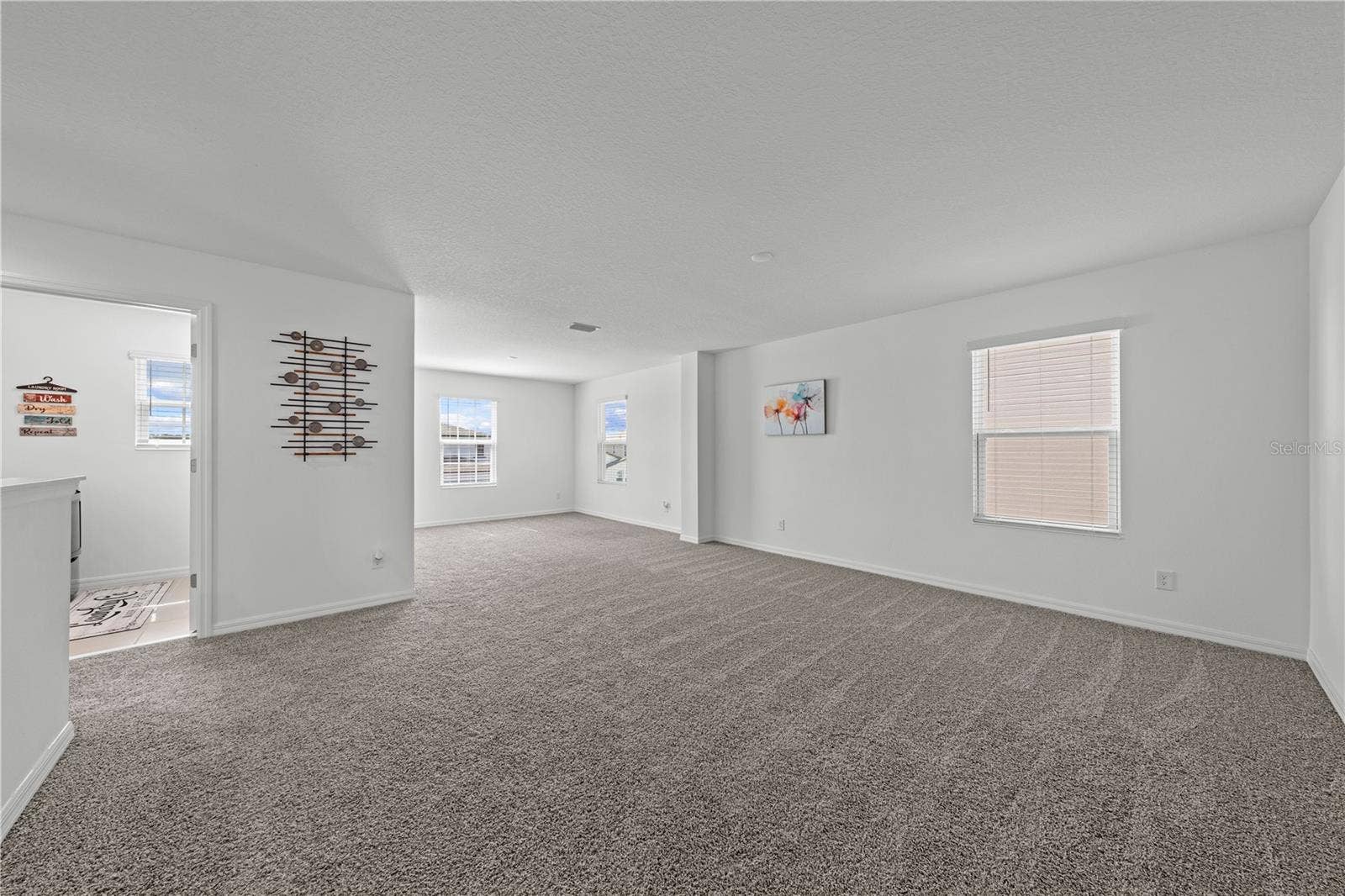 5657 CAMILLA STREET, St Cloud, FL 34771 Loft with bonus room in the back