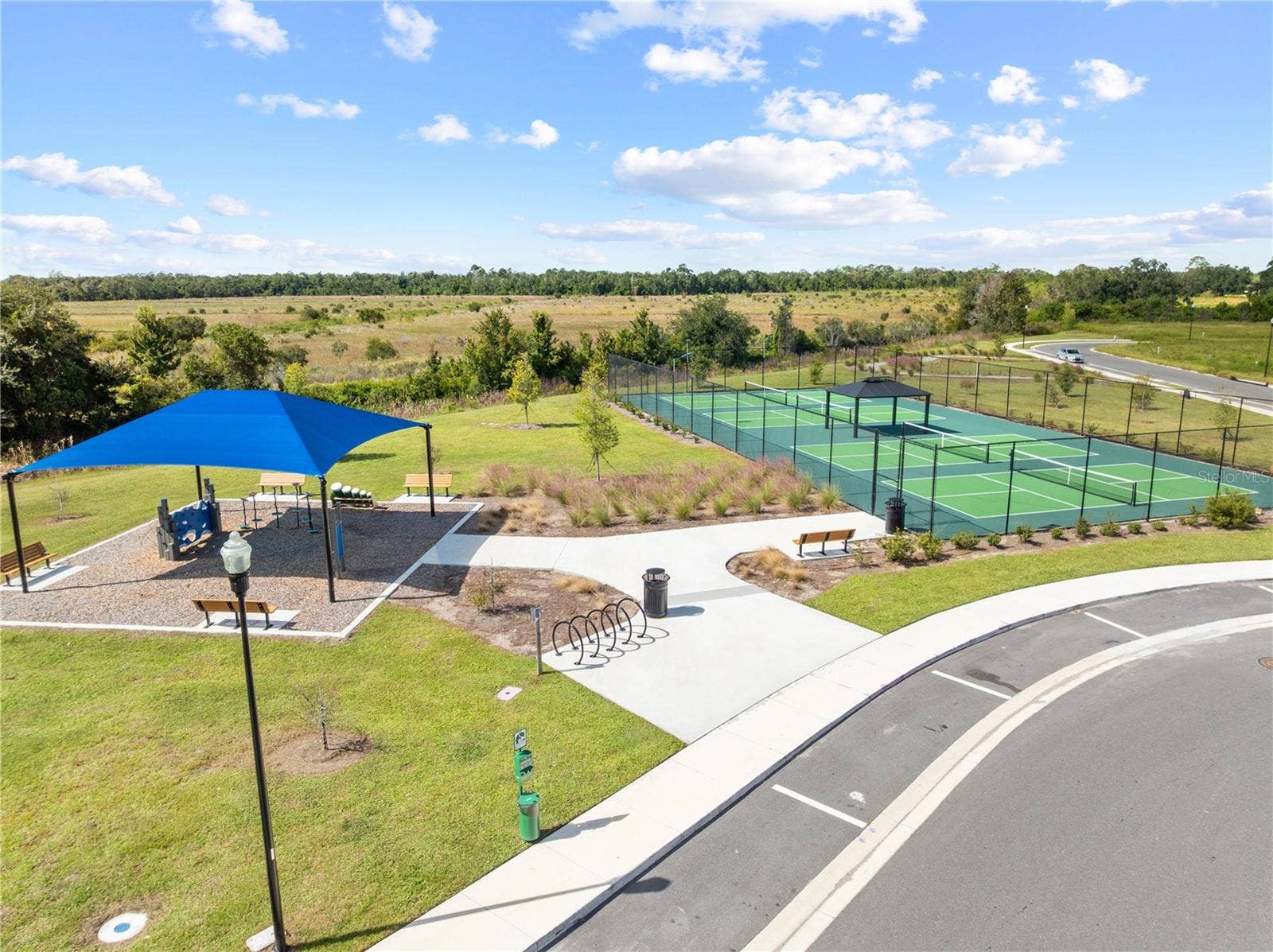 5657 CAMILLA STREET, St Cloud, FL 34771 Aerial of community park and tennis court