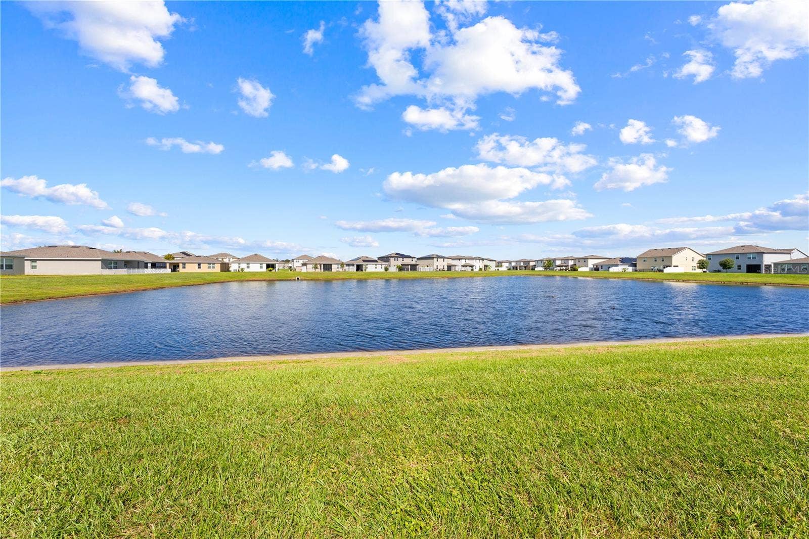 5657 CAMILLA STREET, St Cloud, FL 34771 view from back yard