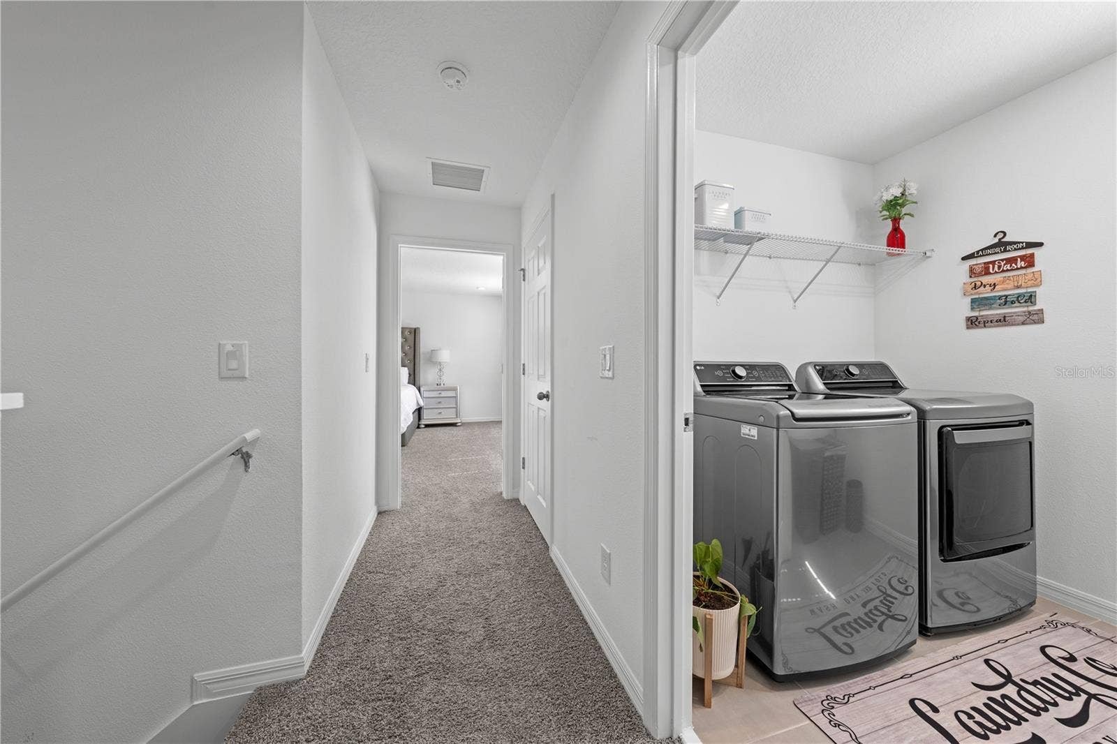 5657 CAMILLA STREET, St Cloud, FL 34771 Hall to master and laundry room on the right