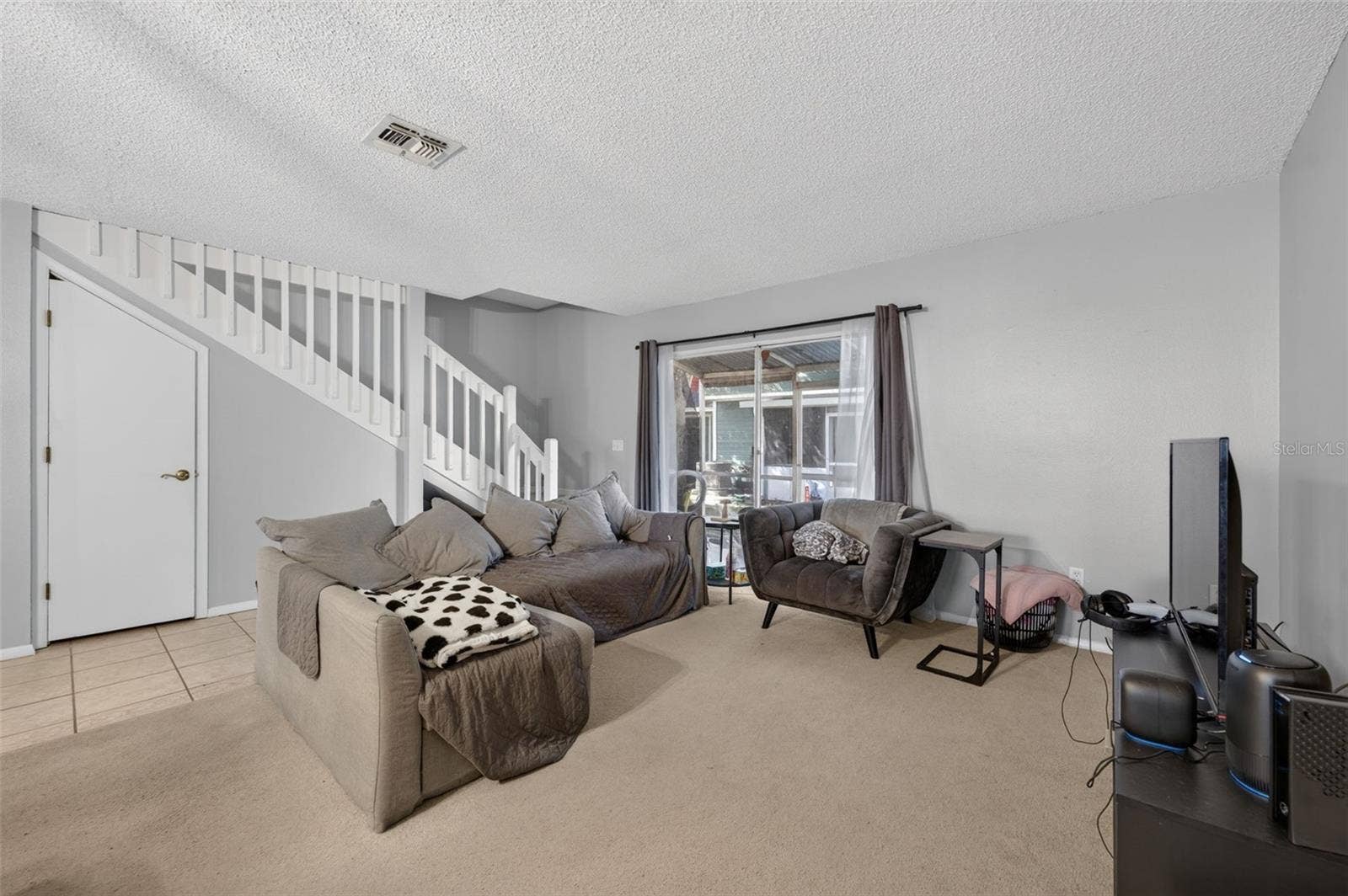 Bring your big sectional, this room is spacious!
