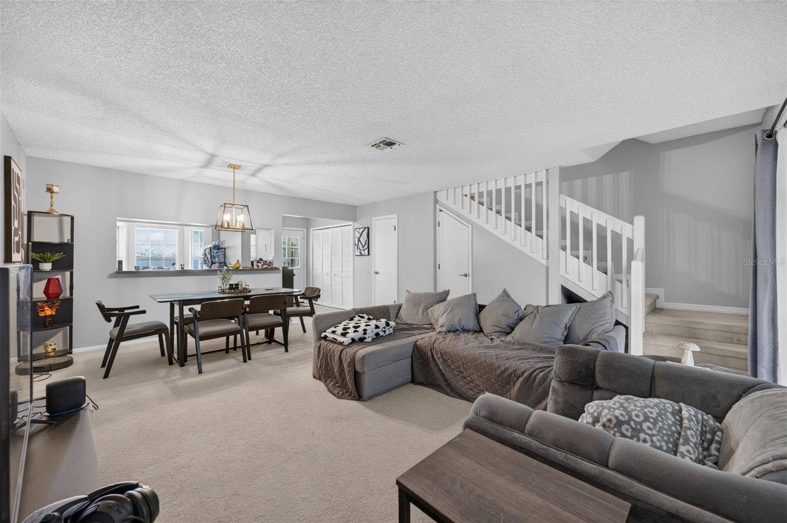 Large living space and dining make for such a comfortable place to spend time at home.