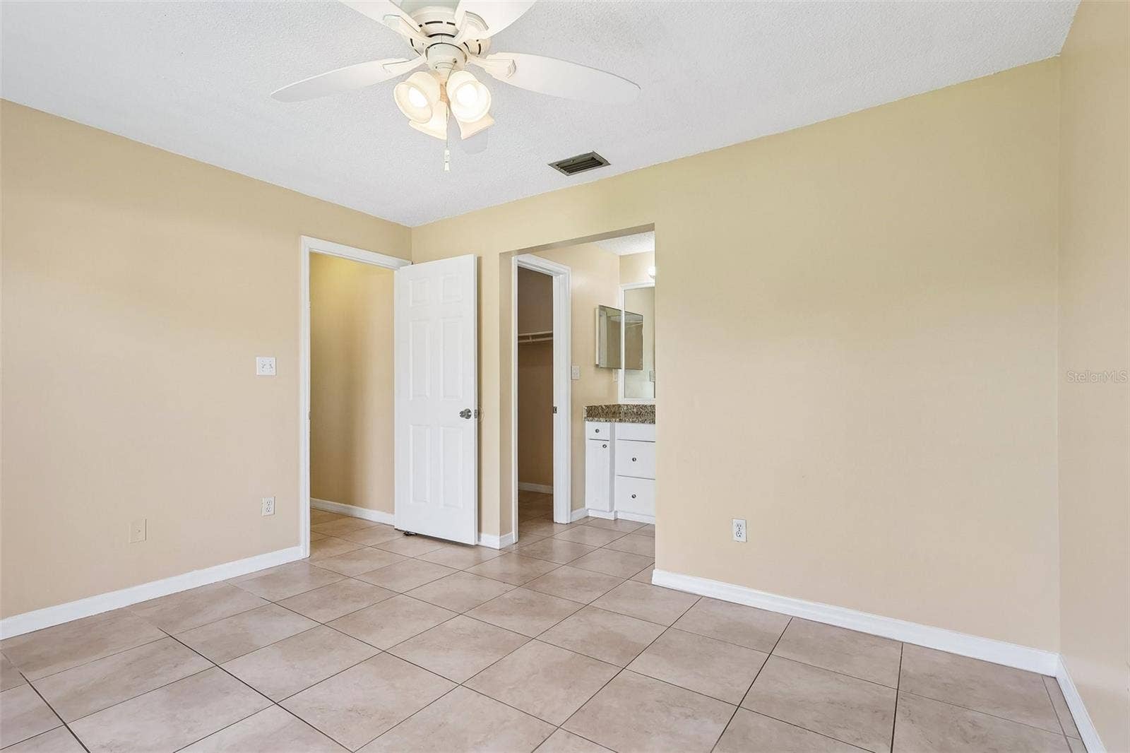 10031 PORTALE AVENUE, Orlando, FL 32825 Primary Suite.