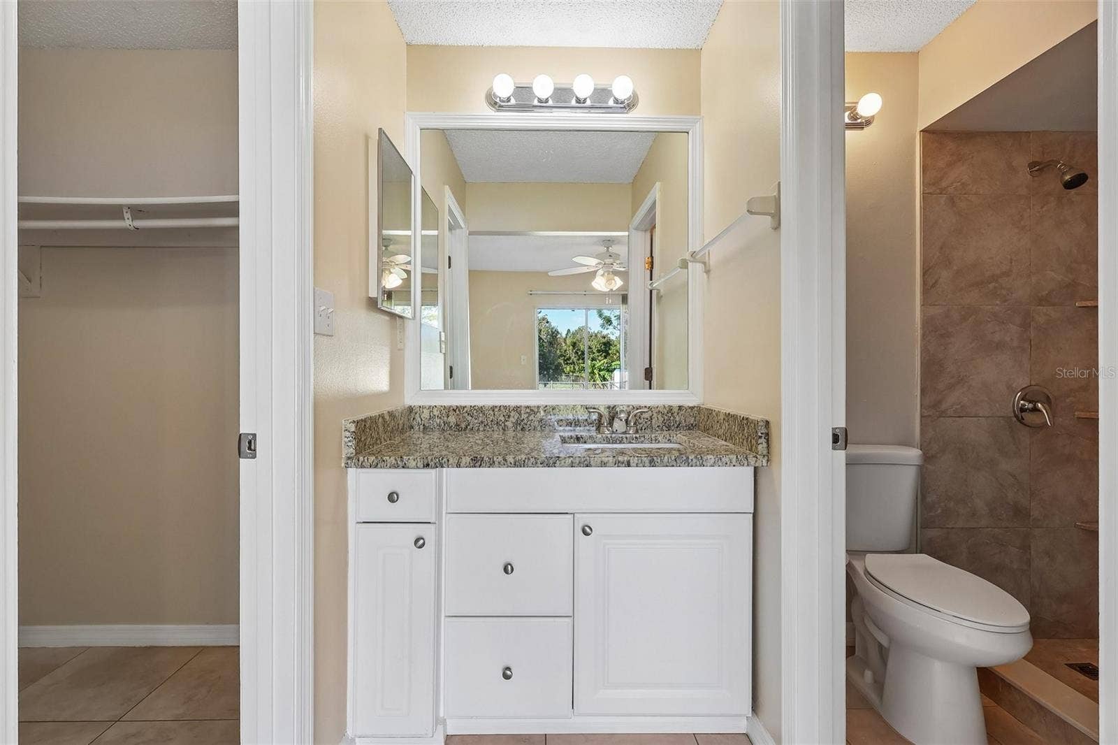 10031 PORTALE AVENUE, Orlando, FL 32825 Primary en-suite bath.