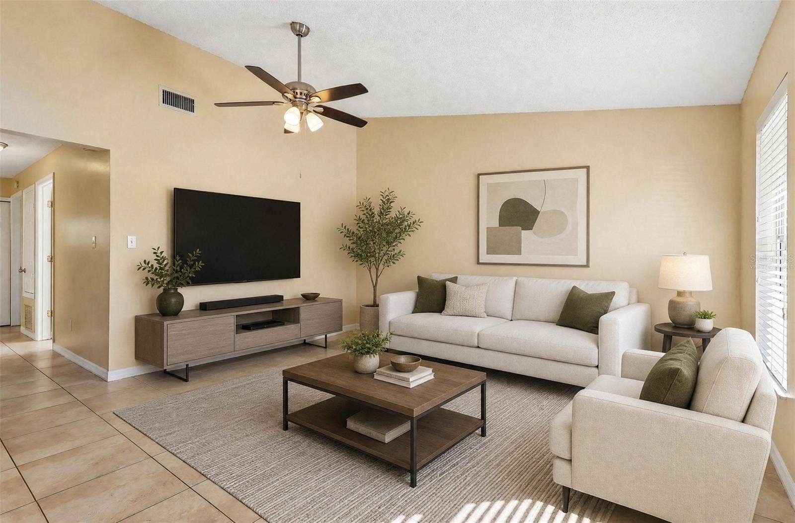 10031 PORTALE AVENUE, Orlando, FL 32825 Living Room. Virtually Staged.