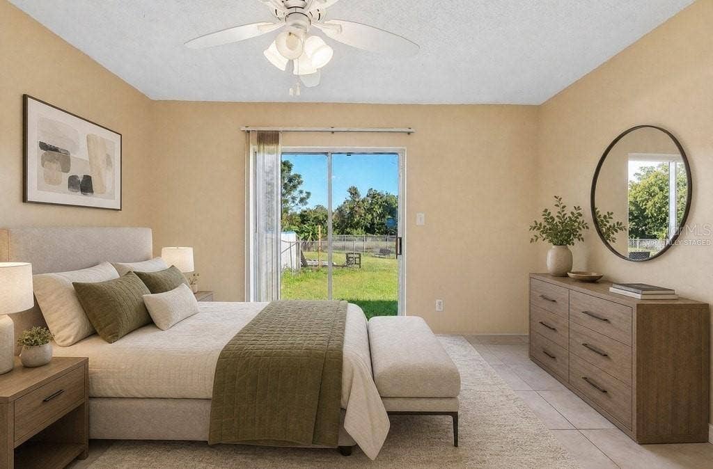 10031 PORTALE AVENUE, Orlando, FL 32825 Primary Suite. Virtually Staged.