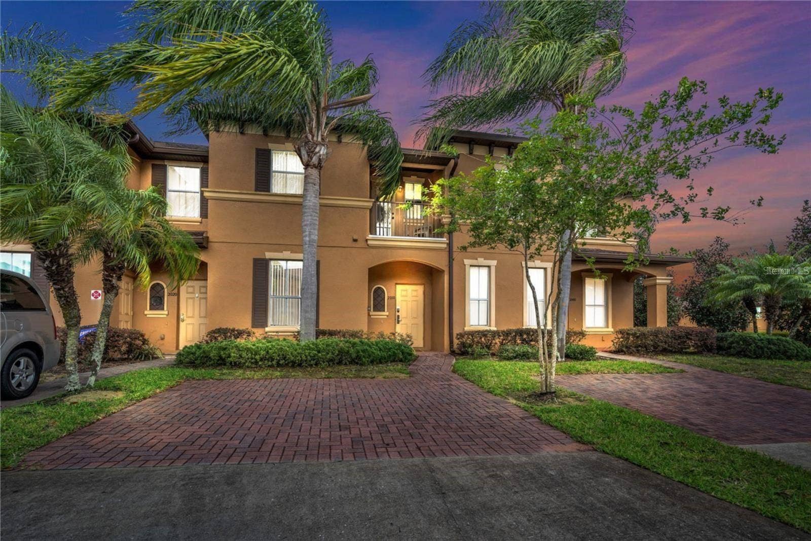 2010 CALABRIA AVENUE, Davenport, FL 33897 Front exterior at twilight