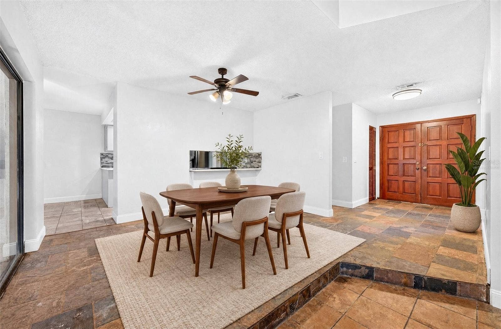 1110 PINE OAKS COURT, Apopka, FL 32712 Dining Area. Virtually Staged.