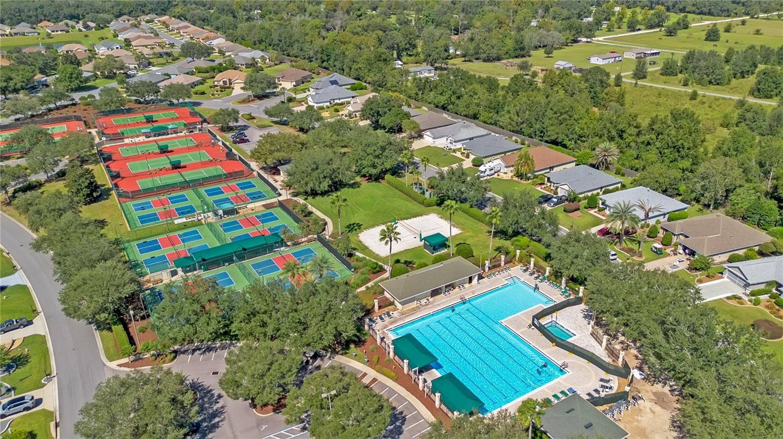 Enjoy resort-style amenities, swimming, tennis, and an active Florida lifestyle at Spruce Creek Golf & Country Club.