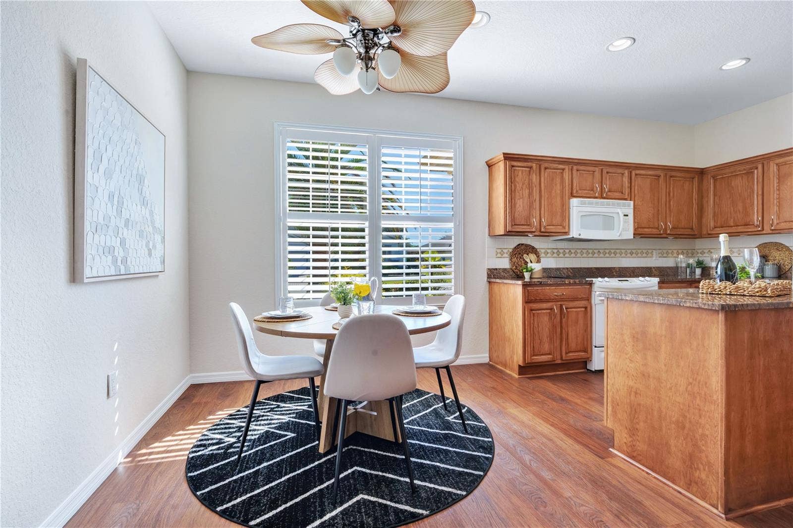 Open kitchen and breakfast area offer an easy, comfortable layout for everyday living.