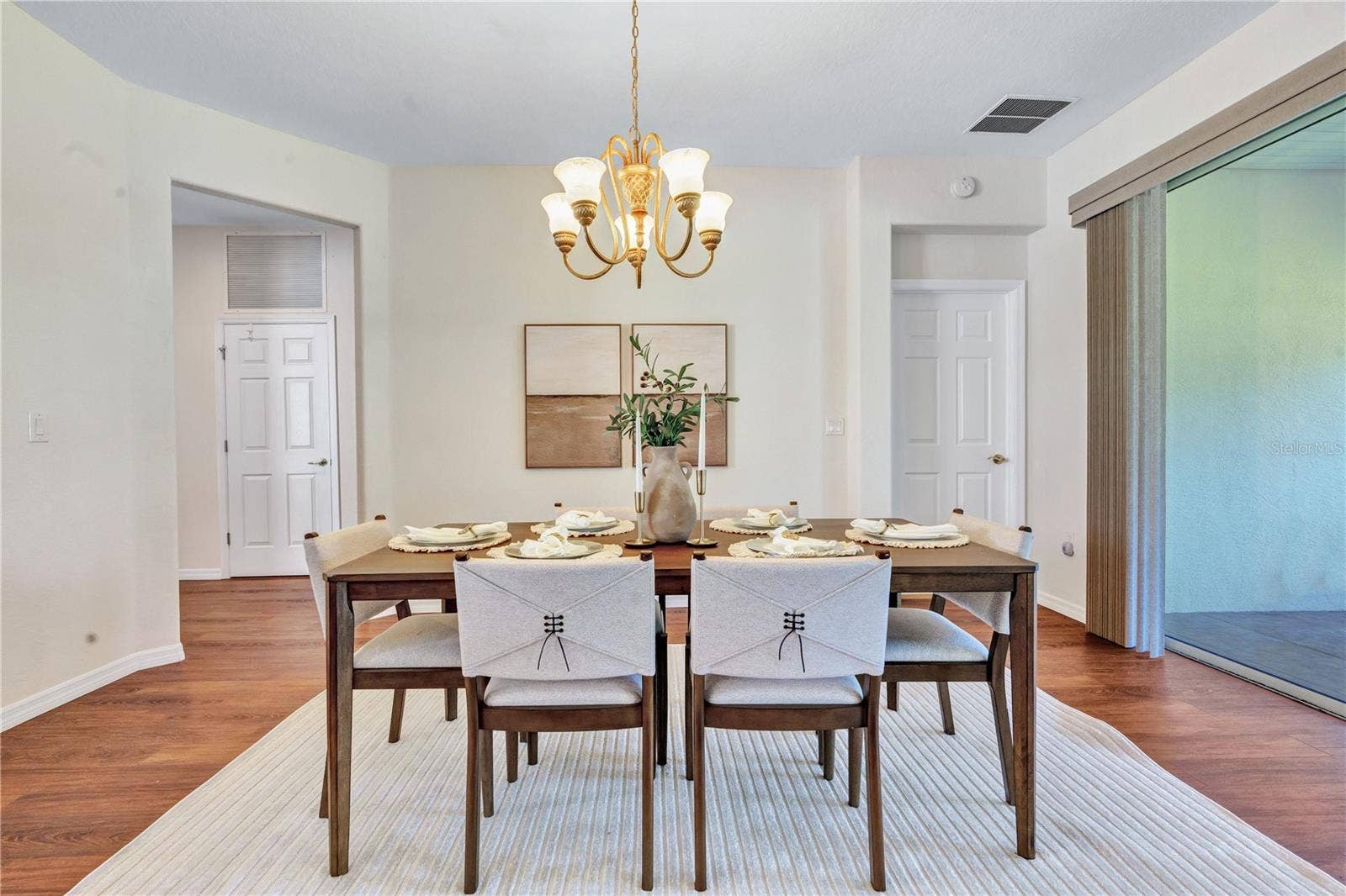 Bright formal dining space complements the Granville model's open, single-level floor plan.