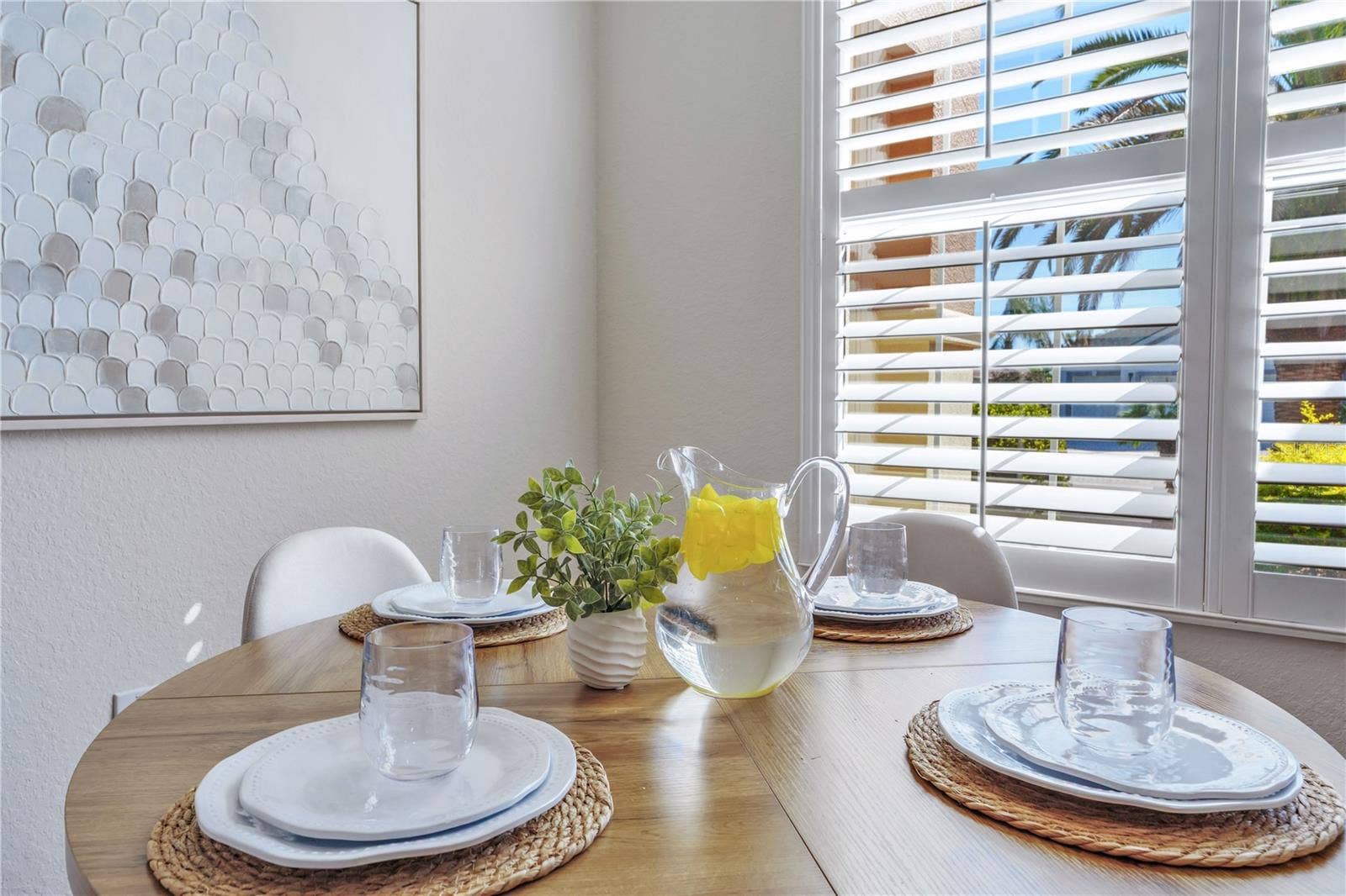Enjoy peaceful mornings and casual meals beside the bright, plantation-shuttered windows.