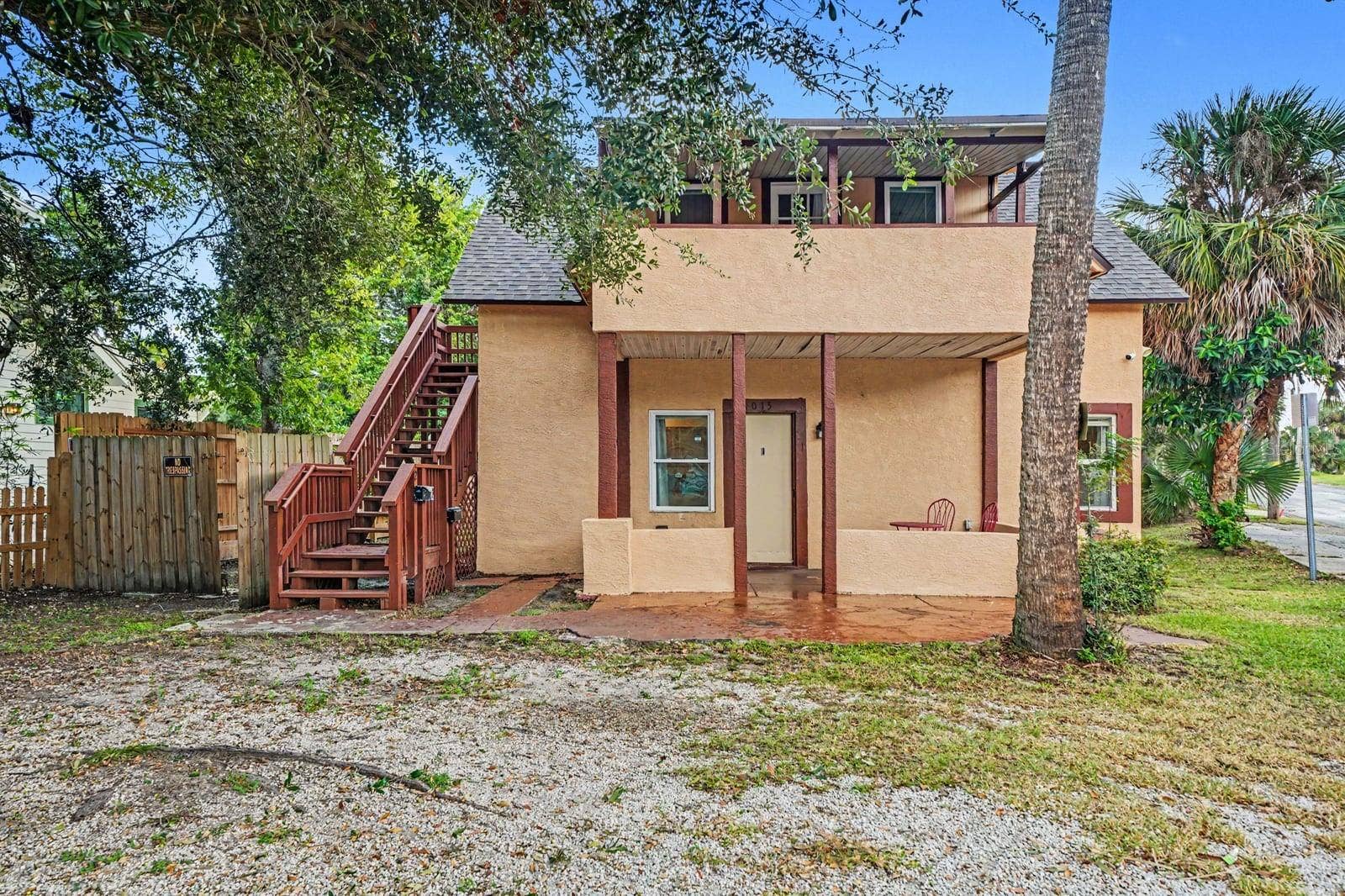 1015 S PENINSULA DRIVE, #1,2, Daytona Beach, FL 32118 Two-Story Home With Brick Steps, Red Railings & Mature Trees