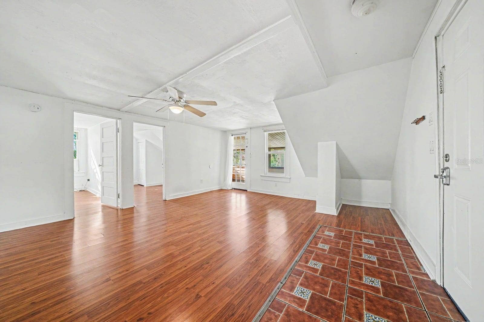 1015 S PENINSULA DRIVE, #1,2, Daytona Beach, FL 32118 Open Upper Level with Sloped Ceilings, Multiple Doors & Fan