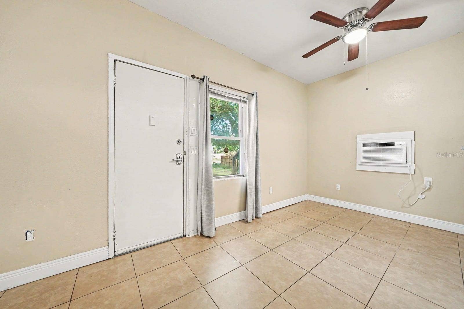 1015 S PENINSULA DRIVE, #1,2, Daytona Beach, FL 32118 Bright Living Space With Tile Flooring & Ceiling Fan