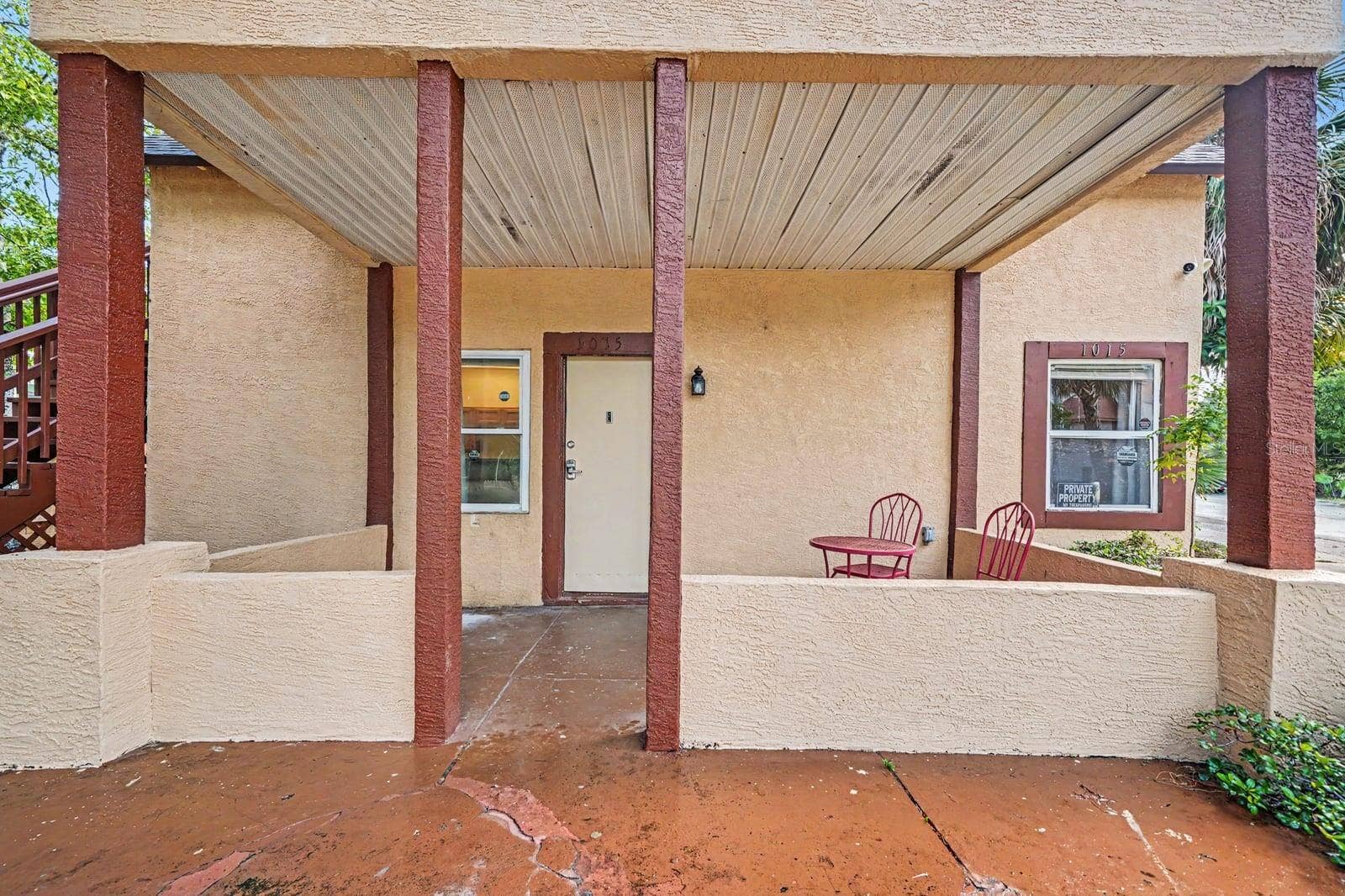 1015 S PENINSULA DRIVE, #1,2, Daytona Beach, FL 32118 Covered Patio With Metal Beam Support & Brick Flooring