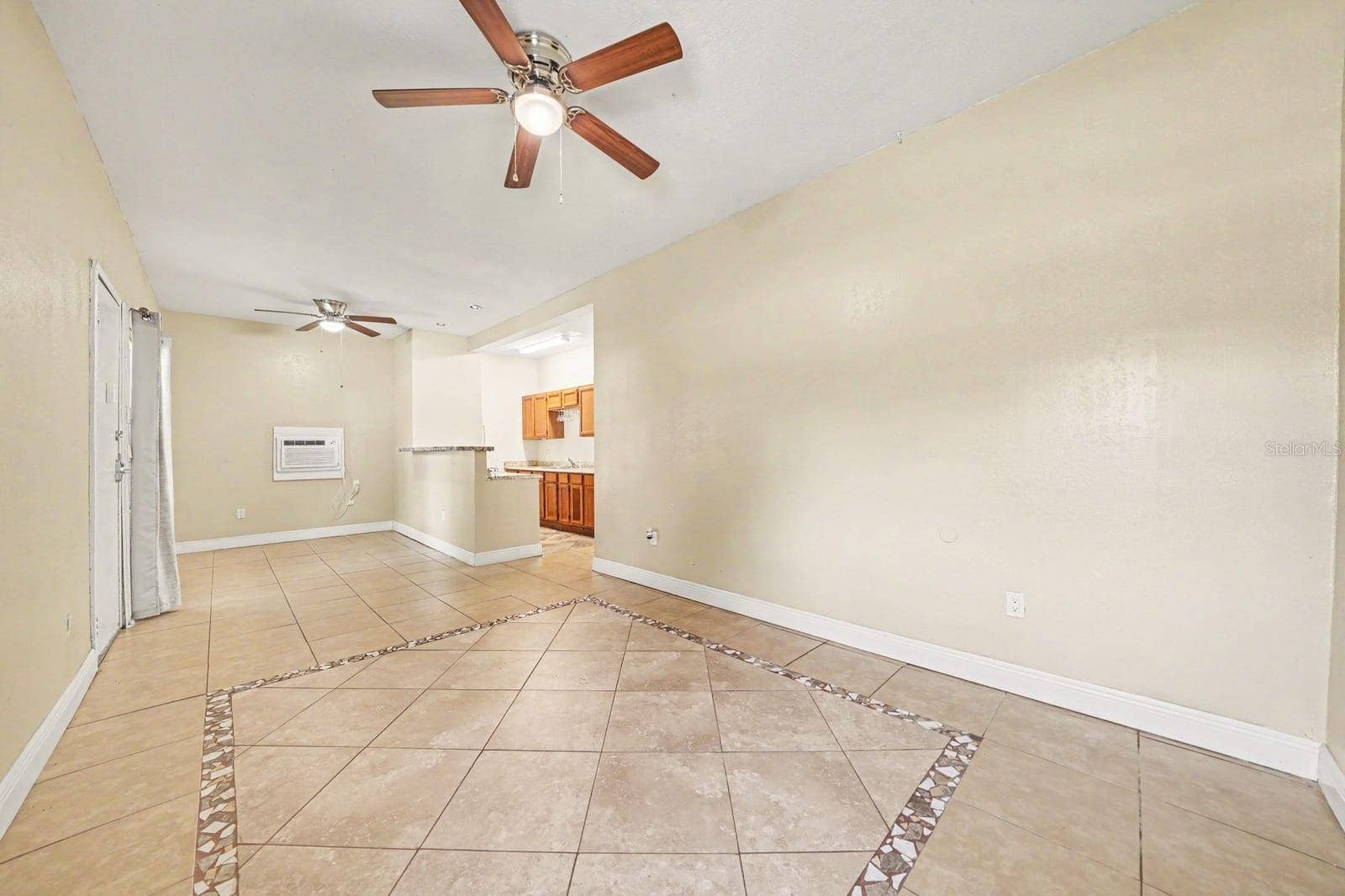 1015 S PENINSULA DRIVE, #1,2, Daytona Beach, FL 32118 Open Floor Plan With Tile Details & Kitchen Cabinetry Access