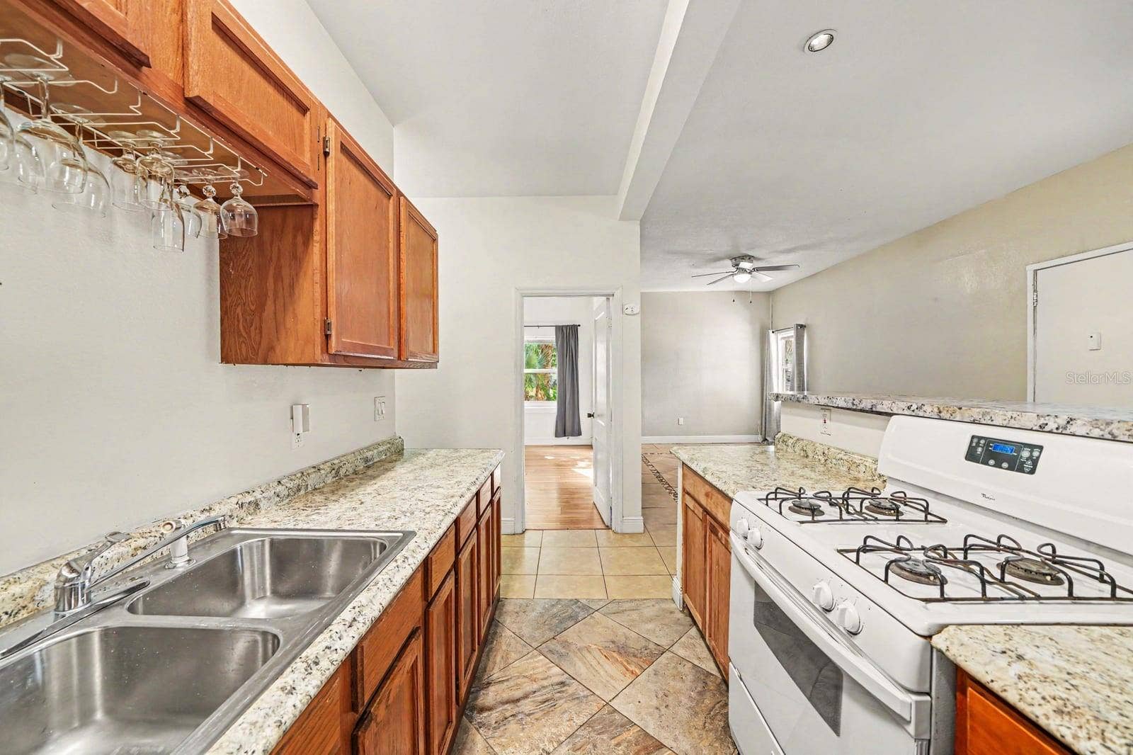 1015 S PENINSULA DRIVE, #1,2, Daytona Beach, FL 32118 Spacious Kitchen Featuring Dual Gas Ranges, Granite Tops & Wood Cabinetry