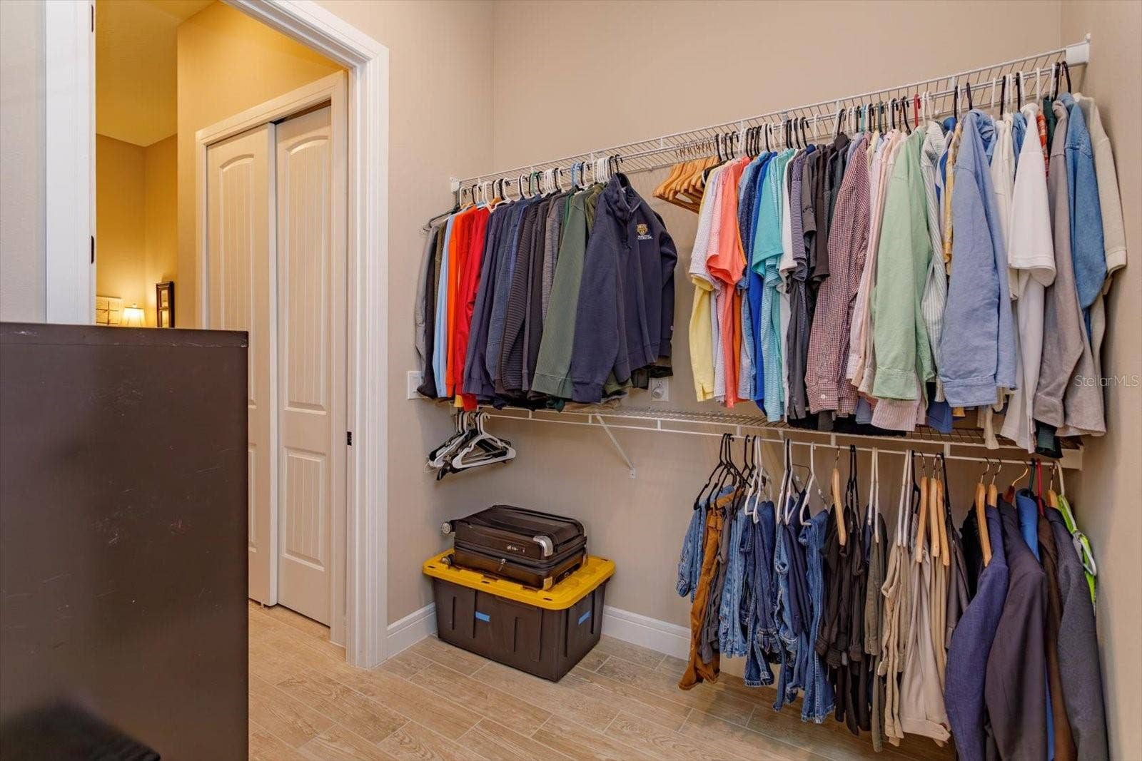 5663 SW 92ND AVENUE ROAD, Ocala, FL 34481 Second Walk-in Closet in the primary Suite with a Walk-Through into the Laundry Room
