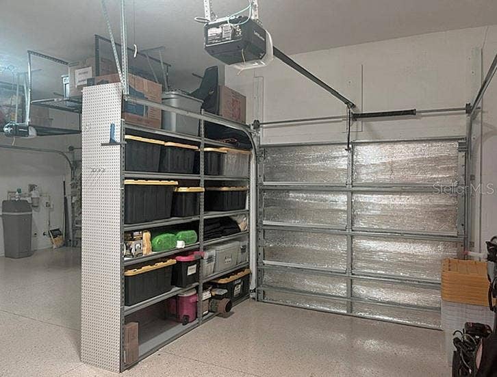 5663 SW 92ND AVENUE ROAD, Ocala, FL 34481 Additional Storage area and Single Side of the 3-car Garage