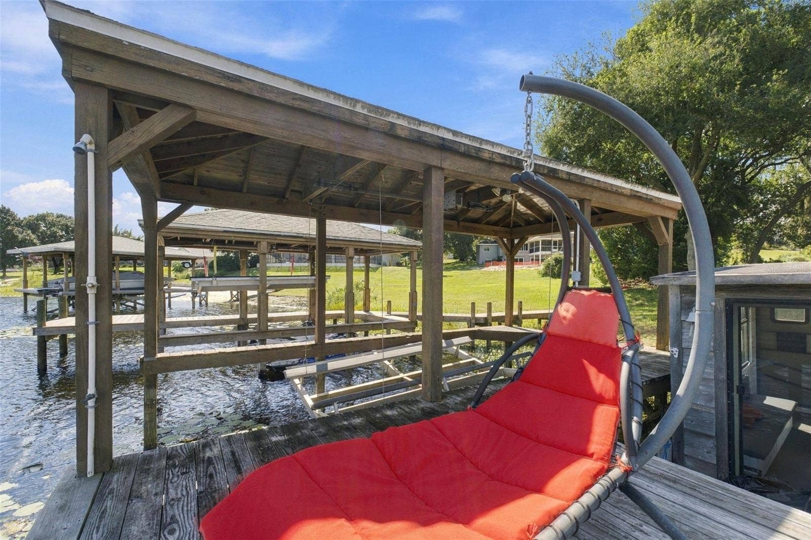 11025 LAKE KATHERINE CIRCLE, Clermont, FL 34711 Boathouse w/water
