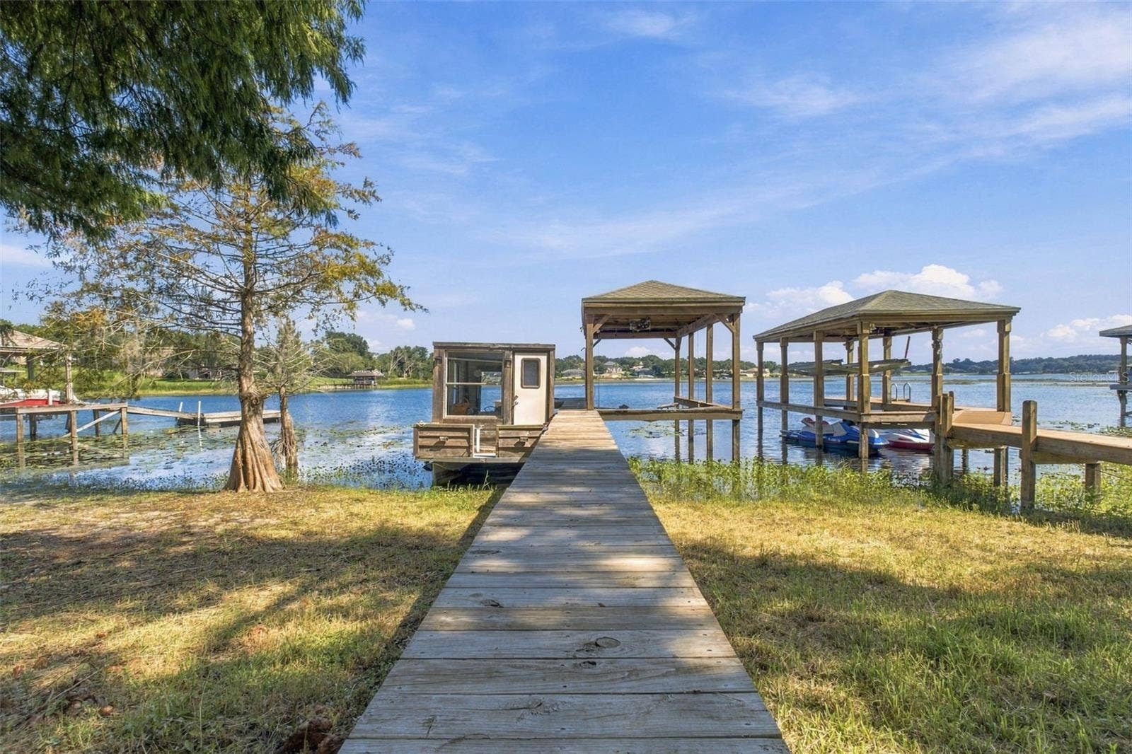11025 LAKE KATHERINE CIRCLE, Clermont, FL 34711 Dock with lift and water
