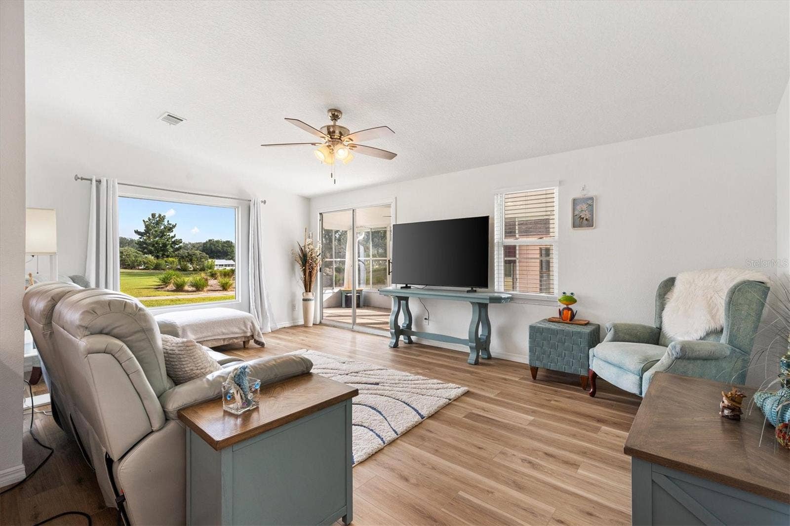 Spacious & Relaxing Living Room with beautiful view of golf course