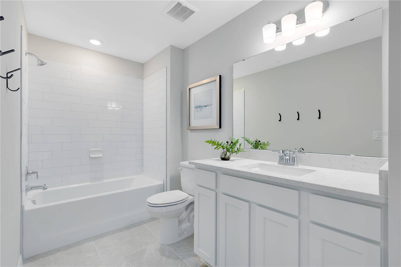 3198 EMERALD ACRES LANE, Sanford, FL 32771 Model Home Design Only. Pictures and furnishings are for illustrative purposes only. Elevations, colors and options may vary. Furniture is for model home staging only.