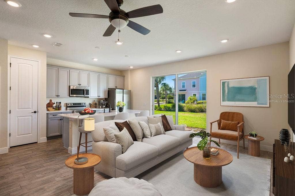 2910 CASTAWAY LANE, Kissimmee, FL 34747 Living Room (virtually staged)