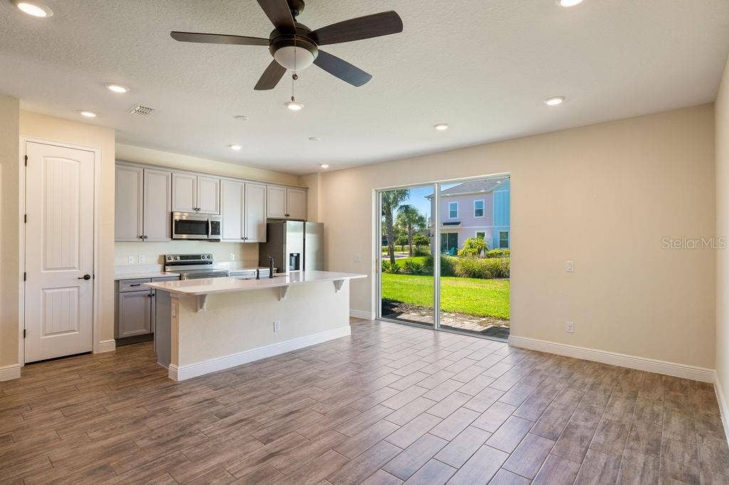 2910 CASTAWAY LANE, Kissimmee, FL 34747 Living Room/Kitchen